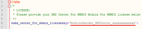 SMS Center For WHMCS: license.php file open in an editor with the license key entered between quotation marks